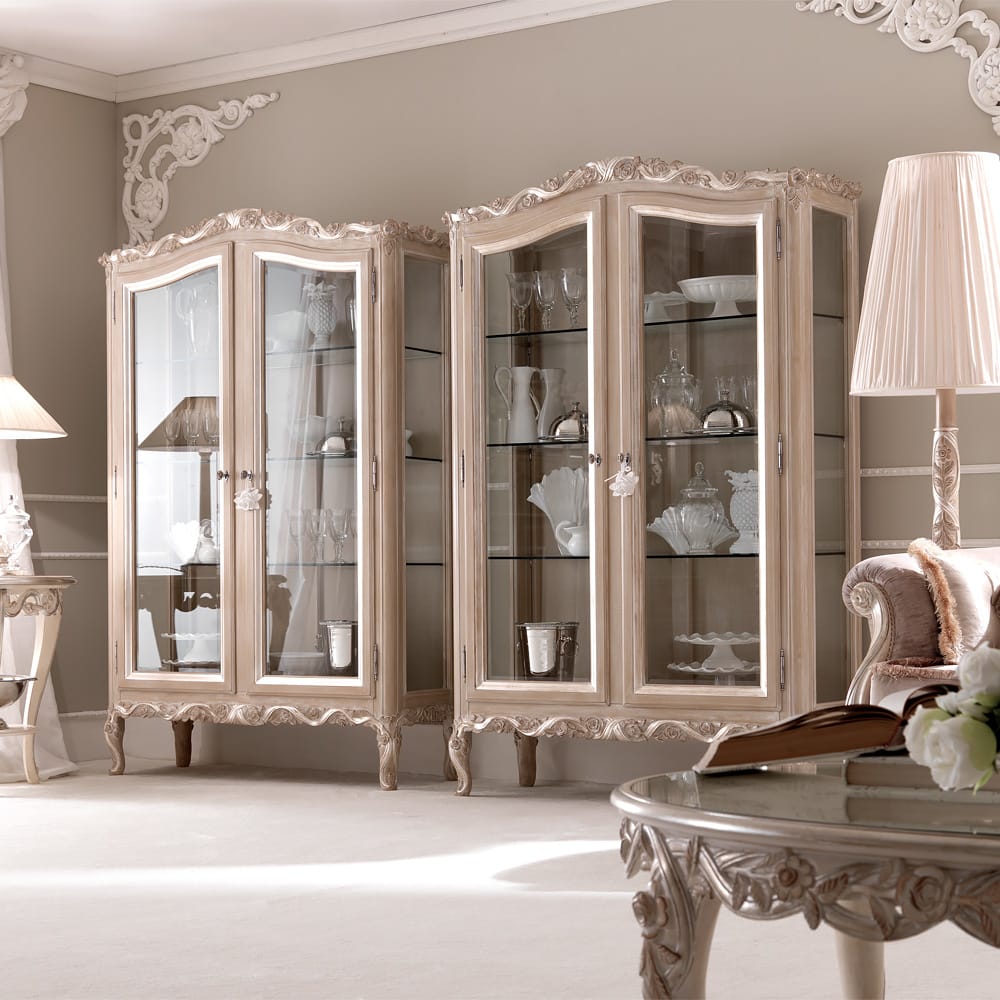 Impress the guests, classic glass fronted display cabinet, hand carved ribbon design top and bottom