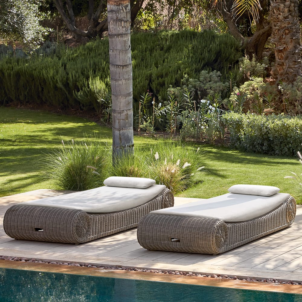 Outdoor furniture, luxury wicker sun lounger by pool