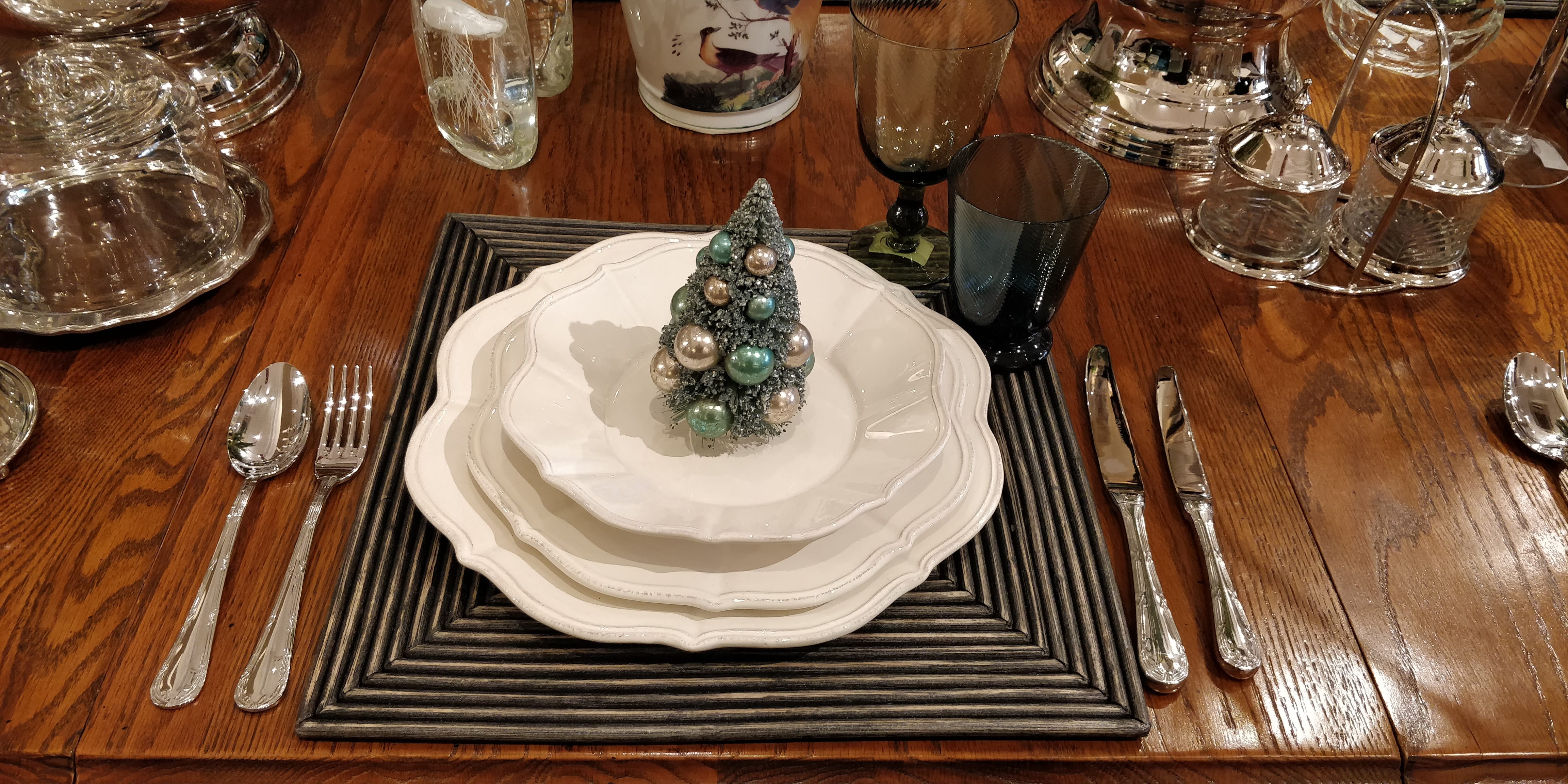 Christmas All Wrapped Up, elegant table setting with mini Christmas tree decoration