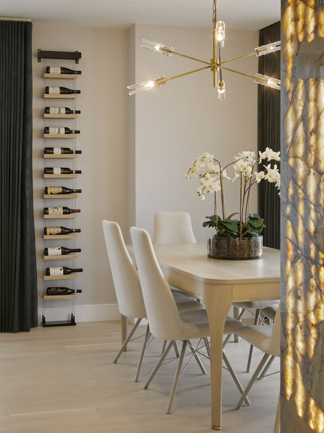 Wine rack, dining table and modern bespoke chandelier 